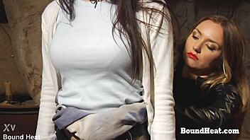 Busty lesbian slave gets big black strapon from mistress for pussy pleasure