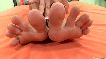 blonde teen gives footjob domination