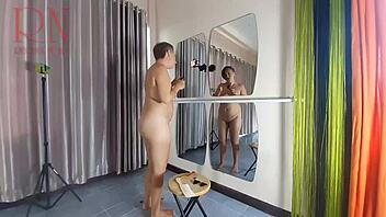 Naked Nudist Hairdresser Regina Noir Cuts Her Own Hair in Kinky Display