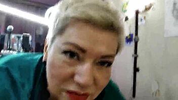 Aimee, the mature cocksucker, gets close-up action with her neighbor's dick.