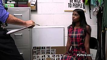 Exotic thief drops to her knees for two massive cocks in office