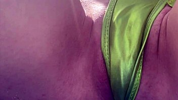 Check out this Italian milf flashing her tight shaved pussy at Miami's public beach! So hot!