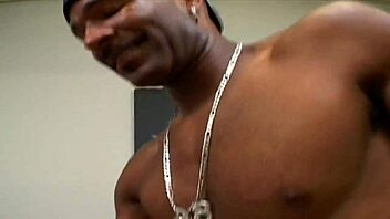 busty brunette fucks black stud in bed.