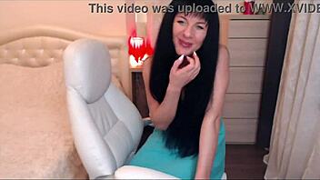 sexy brunette helga muah teases in chair with perky tits