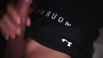 hot guy jerks off big cock in tight workout clothes with moaning on bed