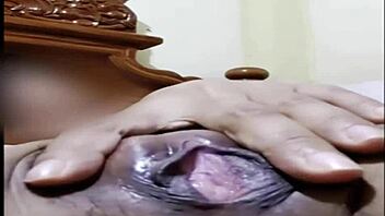 filipina girl locks the door for a video call sex session