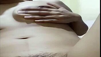 filipina girl locks the door for a video call sex session