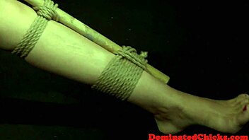 tormented bitch tied up and punished in garage