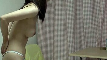 Kotono Morishita strips off her miniskirt uniform in a cute Japanese webcam show.