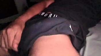 hot guy jerks off big cock in tight workout clothes with moaning on bed