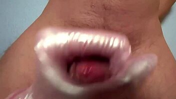 A Nurse in Medical Gloves Assists Patient