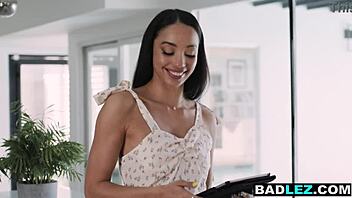 slender ebony realtor fucks a busty blonde lesbian milf client using a strapon in this hot scene