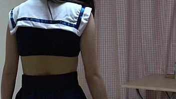 Kotono Morishita strips off her miniskirt uniform in a cute Japanese webcam show.