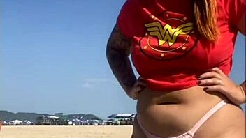 Beach tattoo and excitement, man showed his dick