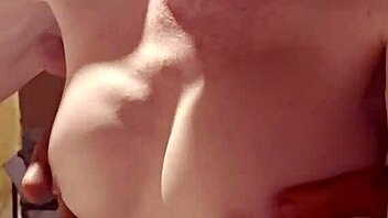 playing with her tits handjob.