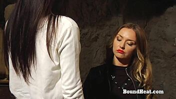 mistress punishes slave with strapon in bondage scene