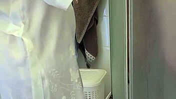 Stepmom jerks off son in bath for cum finish.