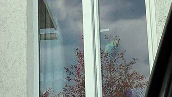 Public Nudity: Naked Milf in Stockings Washes Window for Taxi Driver.