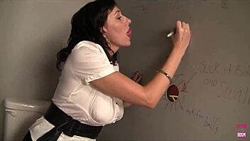 alia rubs her wet pussy while suckin cock from the hole in the wall