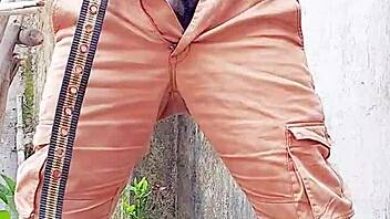 I watched old cuckold's small hairy black cock get pissed on outdoors