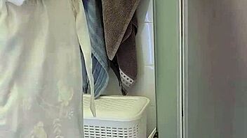 Stepmom jerks off son in bath for cum finish.