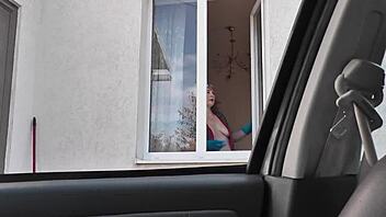 Public Nudity: Naked Milf in Stockings Washes Window for Taxi Driver.