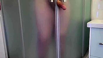 Stepmom jerks off son in bath for cum finish.