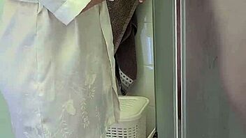 Stepmom jerks off son in bath for cum finish.