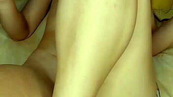 Watch this blonde girl in lingerie fuck herself with a big pink dildo