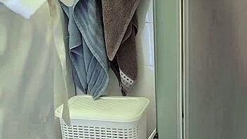 Stepmom jerks off son in bath for cum finish.