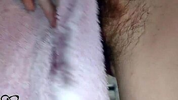 Housewife with braces flashes in the bathroom