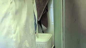 Stepmom jerks off son in bath for cum finish.