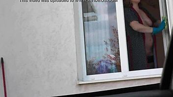 Public Nudity: Naked Milf in Stockings Washes Window for Taxi Driver.