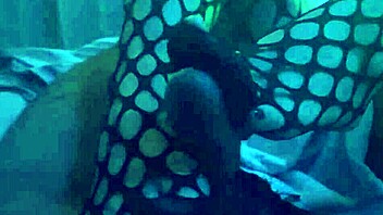 Sexy nylon footjob in leggings.