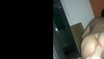 Wife fists husband's ass with her foot in anal play.