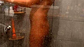 hot milf is having multiple magic wand orgasms in shower