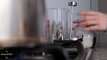 young lesbian interacts with friend's face in intimate moment