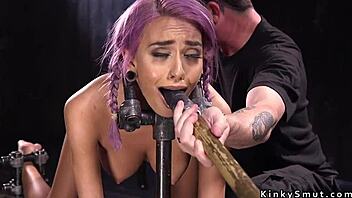 purple haired petite 18+ sub in device bondage