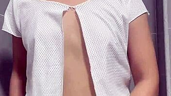 she's touching her tits while dancing seductively