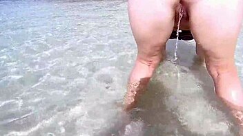 Chubby Ass Pissing Outdoors Versus Beach Close-Up