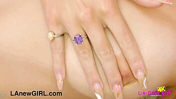 lovely blonde beauty reveals gorgeous figure on sofa