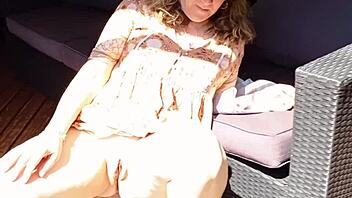 Mature woman enjoys close-up view of her natural body in homemade setting