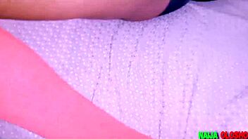 Watch this horny babe play with her big tits and pussy!