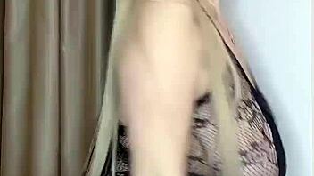 Milf with big natural tits in transparent clothes?