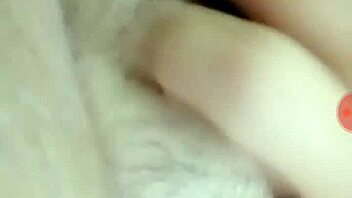 A person is masturbating privately in their room