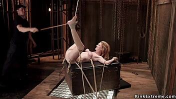 Blonde Slave Gets Pussy Pierced And Caned