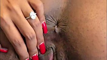Hot Ebony Slut Fingers Her Pussy And Plays With Her Pierced Clit