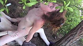 Horny grunge couple enjoys a screw in the park.