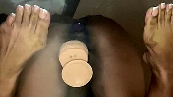 Ebony Takes Dildo Deep in Pussy