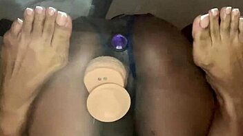 Ebony Takes Dildo Deep in Pussy